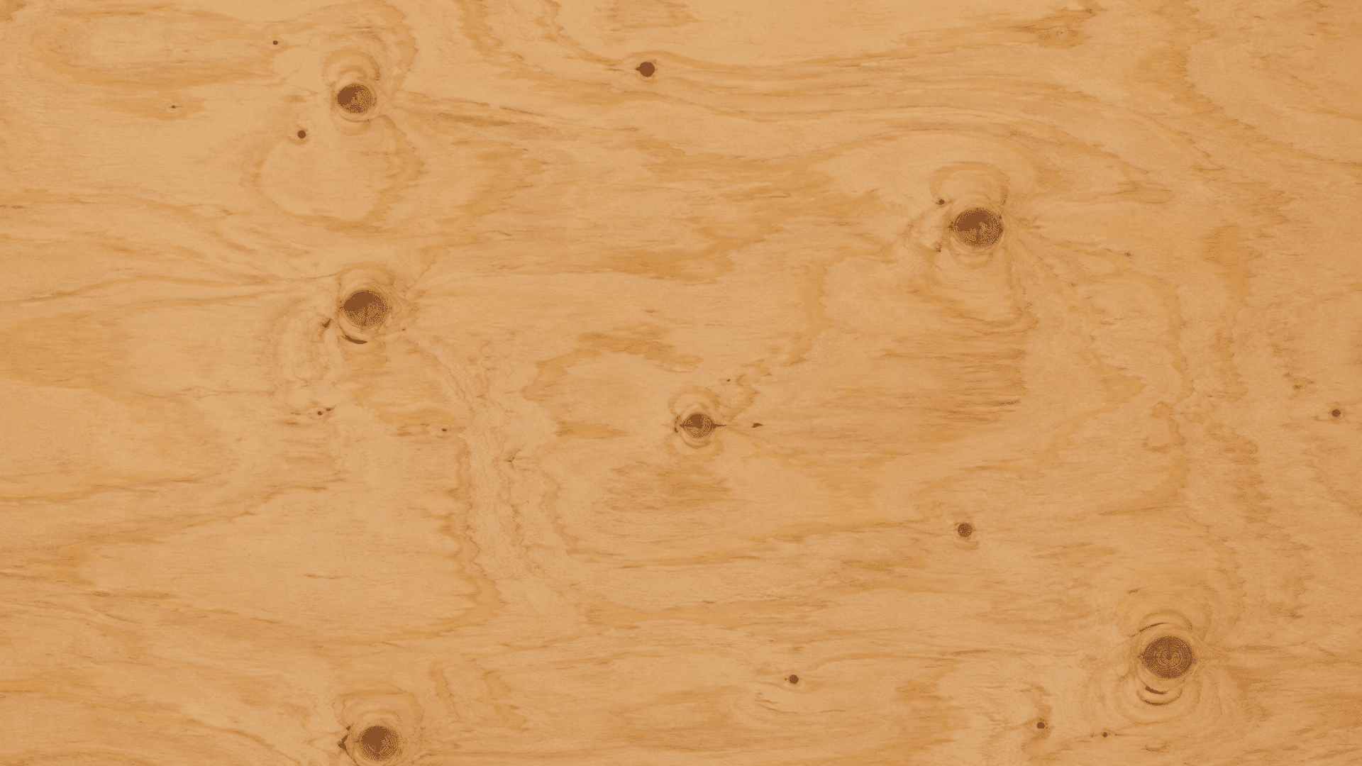 light plywood texture with flowing natural grain patterns and scattered dark knots across the smooth wooden surface