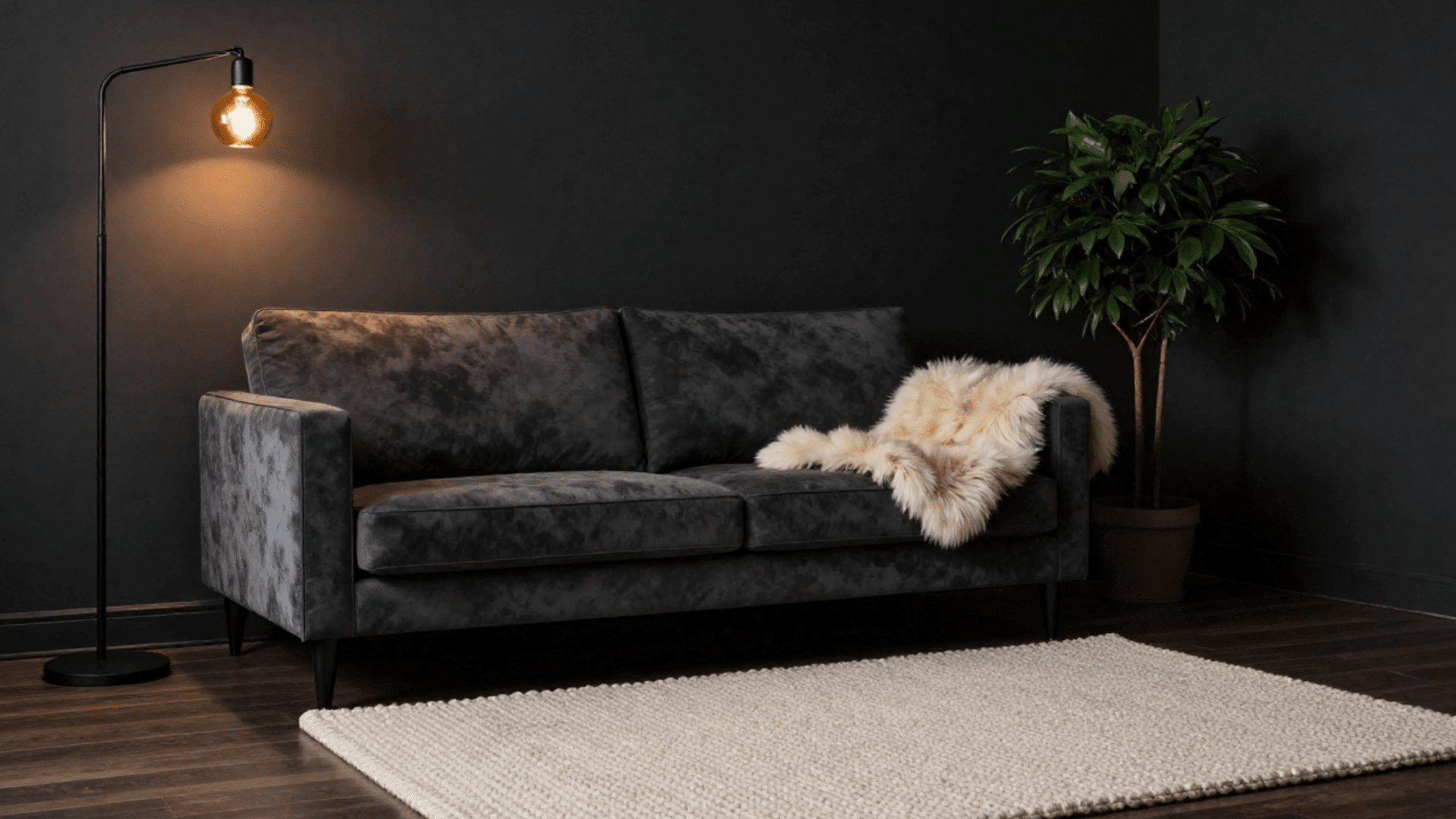 nordic noir living room with charcoal walls dark velvet sofa amber floor lamp and knit rug